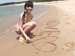 Skinny Japanese Beauty Strips Down on the Shore